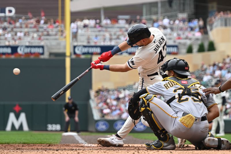 Aug 20, 2023; Minneapolis, Minnesota, USA; Minnesota Twins second baseman Edouard Julien (47) hits a run scoring double off Pittsburgh Pirates relief pitcher Jose Hernandez (not pictured) as catcher Endy Rodriguez (25) looks on during the seventh inning at Target Field. Mandatory Credit: Jeffrey Becker-USA TODAY Sports