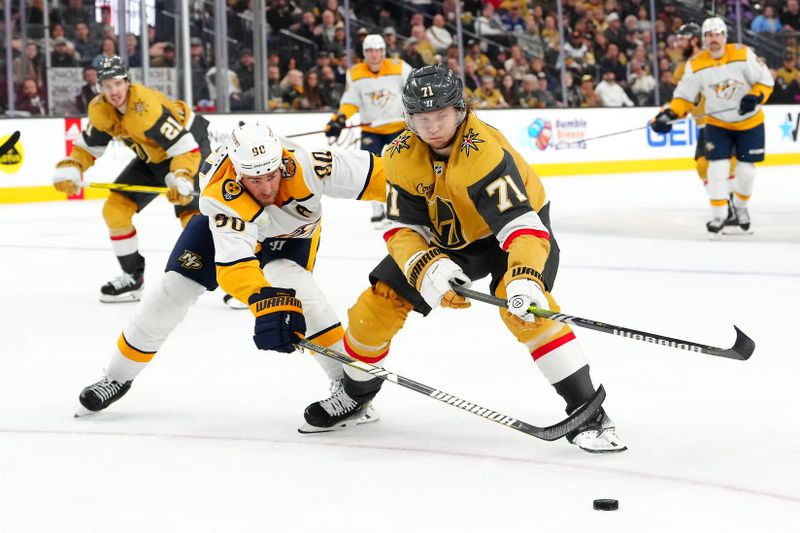 Feb 20, 2024; Las Vegas, Nevada, USA; Vegas Golden Knights center William Karlsson (71) keeps the puck away from Nashville Predators center Ryan O'Reilly (90) during the second period at T-Mobile Arena. Mandatory Credit: Stephen R. Sylvanie-USA TODAY Sports