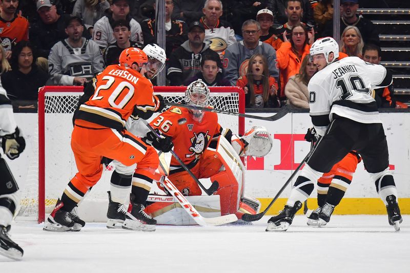 Nov 29, 2024; Anaheim, California, USA; Anaheim Ducks goaltender John Gibson (36) defends the goal against Los Angeles Kings left wing Tanner Jeannot (10) during the second period at Honda Center. Mandatory Credit: Gary A. Vasquez-Imagn Images