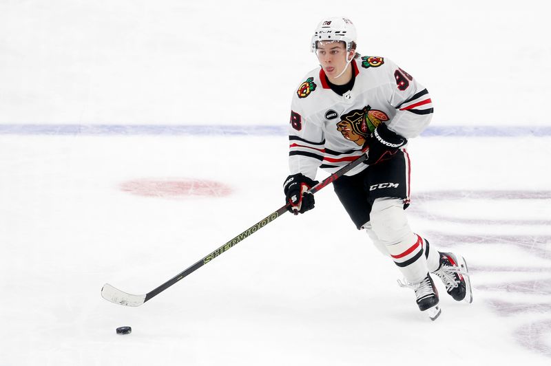 Oct 10, 2023; Pittsburgh, Pennsylvania, USA; Chicago Blackhawks center Connor Bedard (98) carries the puck up ice against the Pittsburgh Penguins during the second period at the PPG Paints Arena. Mandatory Credit: Charles LeClaire-USA TODAY Sports