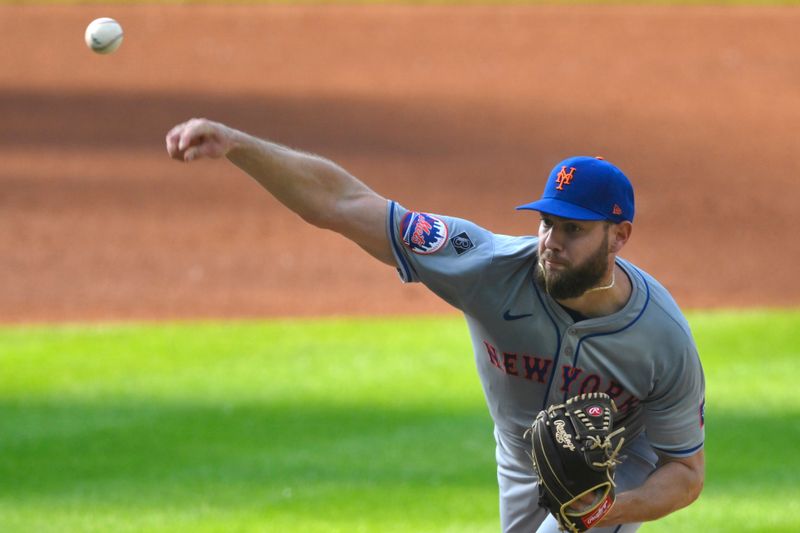 May 21, 2024; Cleveland, Ohio, USA; New York Mets starting pitcher Adrian Houser (35) delivers a pitch in the first inning against the Cleveland Guardians at Progressive Field. Mandatory Credit: David Richard-USA TODAY Sports