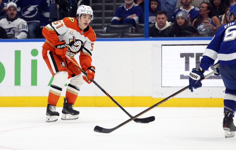 Jan 16, 2025; Tampa, Florida, USA; Anaheim Ducks defenseman Olen Zellweger (51) skates with the puck against the Tampa Bay Lightning during the second period at Amalie Arena. Mandatory Credit: Kim Klement Neitzel-Imagn Images