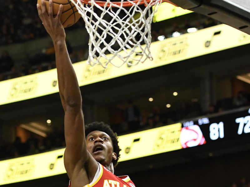 SALT LAKE CITY, UTAH - FEBRUARY 03: De'Andre Hunter #12 of the Atlanta Hawks shoots during the second half of a game against the Utah Jazz at Vivint Arena on February 03, 2023 in Salt Lake City, Utah.  NOTE TO USER: User expressly acknowledges and agrees that, by downloading and or using this photograph, User is consenting to the terms and conditions of the Getty Images License Agreement. (Photo by Alex Goodlett/Getty Images)