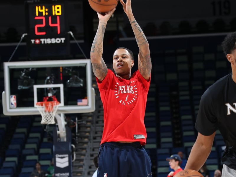 NEW ORLEANS, LA - JANUARY 15:  Jordan Hawkins #24 of the New Orleans Pelicans warms up before the game on January 15, 2025 at the Smoothie King Center in New Orleans, Louisiana. NOTE TO USER: User expressly acknowledges and agrees that, by downloading and or using this Photograph, user is consenting to the terms and conditions of the Getty Images License Agreement. Mandatory Copyright Notice: Copyright 2025 NBAE (Photo by Layne Murdoch Jr./NBAE via Getty Images)