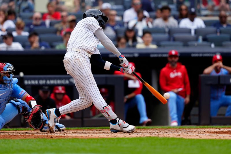 Aug 31, 2024; Bronx, New York, USA; New York Yankees third baseman Jazz Chisholm Jr. (13) hits a single against the St. Louis Cardinals during the fourth inning at Yankee Stadium. Mandatory Credit: Gregory Fisher-USA TODAY Sports