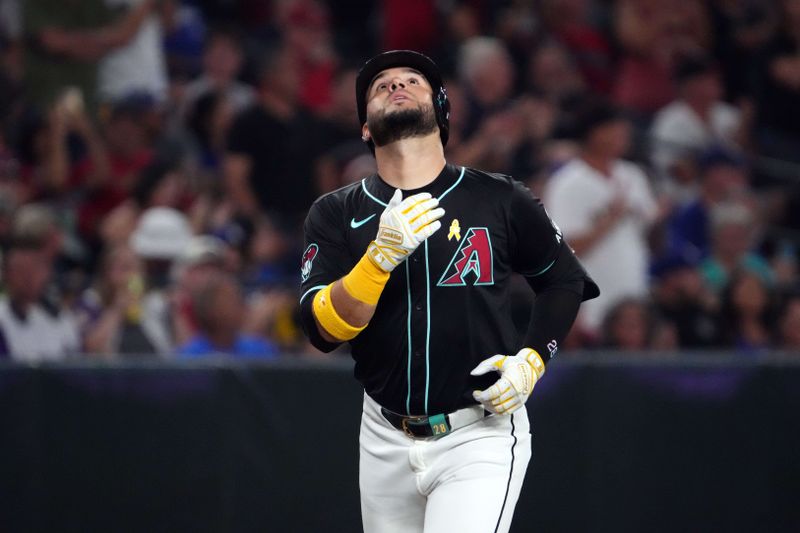 Sep 1, 2024; Phoenix, Arizona, USA; Arizona Diamondbacks third base Eugenio Suárez (28) runs the bases after hitting a solo home run against the Los Angeles Dodgers during the second inning at Chase Field. Mandatory Credit: Joe Camporeale-USA TODAY Sports