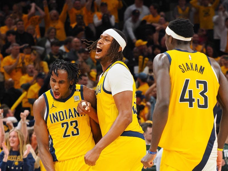 INDIANAPOLIS, IN - APRIL 26:  Aaron Nesmith #23 of the Indiana Pacers reacts after sinking a three point basket against the Milwaukee Bucks during Round 1 Game 3 of the 2024 NBA Playoffs on April 26, 2024 at Gainbridge Fieldhouse in Indianapolis, Indiana. NOTE TO USER: User expressly acknowledges and agrees that, by downloading and or using this Photograph, user is consenting to the terms and conditions of the Getty Images License Agreement. Mandatory Copyright Notice: Copyright 2024 NBAE (Photo by Ron Hoskins/NBAE via Getty Images)