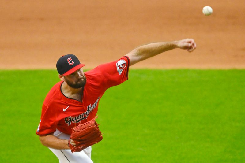 Jul 3, 2024; Cleveland, Ohio, USA; Cleveland Guardians relief pitcher Sam Hentges (31) delivers a pitch in the seventh inning against the Chicago White Sox at Progressive Field. Mandatory Credit: David Richard-USA TODAY Sports