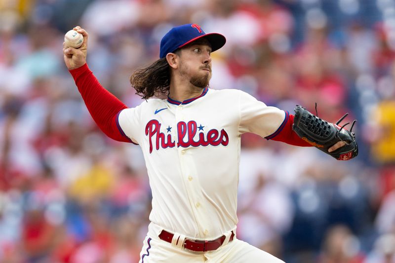 Aug 23, 2023; Philadelphia, Pennsylvania, USA; Philadelphia Phillies starting pitcher Michael Lorenzen (22) throws a pitch during the first inning against the San Francisco Giants at Citizens Bank Park. Mandatory Credit: Bill Streicher-USA TODAY Sports