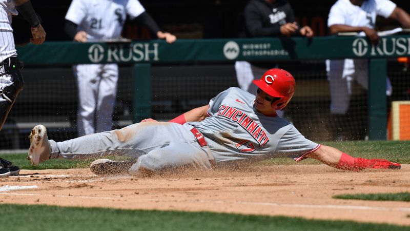 Apr 13, 2024; Chicago, Illinois, USA; Cincinnati Reds right fielder Stuart Fairchild (17) slides into home plate to score during the second inning against the Chicago White Sox at Guaranteed Rate Field. Mandatory Credit: Patrick Gorski-USA TODAY Sports