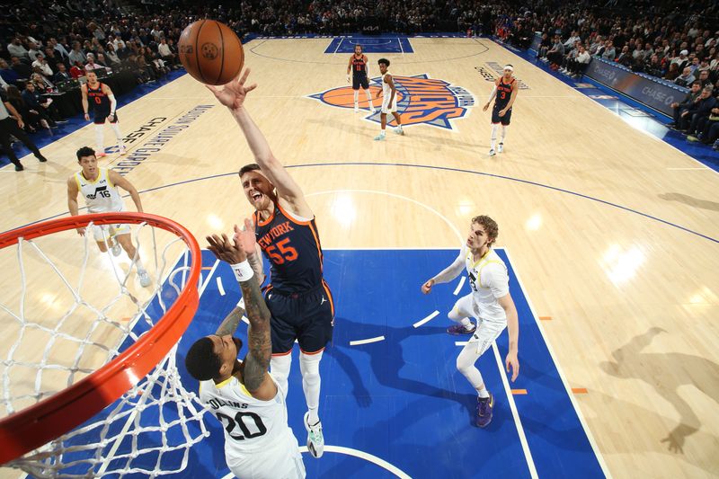 NEW YORK, NY - JANUARY 30: Isaiah Hartenstein #55 of the New York Knicks shoots the ball during the game against the Utah Jazz on January 30, 2024 at Madison Square Garden in New York City, New York.  NOTE TO USER: User expressly acknowledges and agrees that, by downloading and or using this photograph, User is consenting to the terms and conditions of the Getty Images License Agreement. Mandatory Copyright Notice: Copyright 2024 NBAE  (Photo by Nathaniel S. Butler/NBAE via Getty Images)