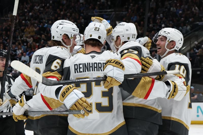 Nov 20, 2025; Salt Lake City, Utah, USA; The Vegas Golden Knights celebrate a goal by defenseman Ben Hutton (17) against the Utah Mammoth during the second period at Delta Center. Mandatory Credit: Rob Gray-Imagn Images