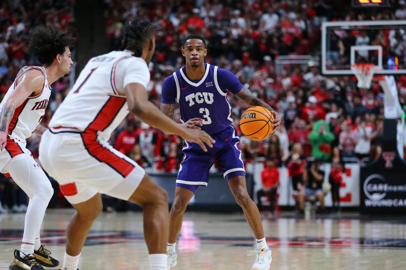 Feb 20, 2024; Lubbock, Texas, USA;  TCU Horned Frogs guard Avery Anderson III (3) looks for an opening against Texas Tech Red Raiders guard Lamar Washington (1) in the first half at United Supermarkets Arena. Mandatory Credit: Michael C. Johnson-USA TODAY Sports