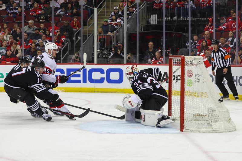 Mar 23, 2024; Newark, New Jersey, USA; Ottawa Senators right wing Drake Batherson (19) scores a goal on New Jersey Devils goaltender Jake Allen (34) during the third period at Prudential Center. Mandatory Credit: Ed Mulholland-USA TODAY Sports