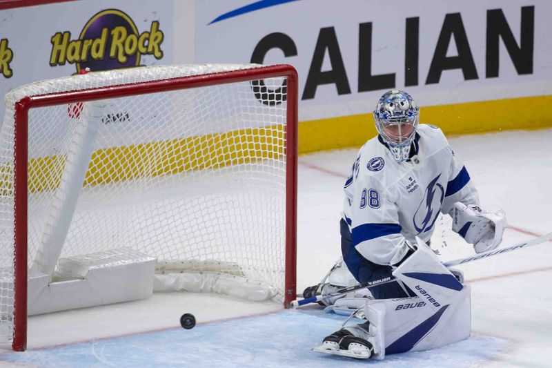 Oct 19, 2024; Ottawa, Ontario, CAN; Tampa Bay Lightning goalie Andrei Vasilevskiy (88) follows the puck in the third period against the Ottawa Senators at the Canadian Tire Centre. Mandatory Credit: Marc DesRosiers-Imagn Images