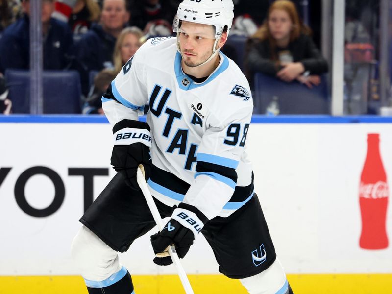 Nov 4, 2025; Buffalo, New York, USA;  Utah Mammoth defenseman Mikhail Sergachev (98) looks to take a shot on goal during the third period against the Buffalo Sabres at KeyBank Center. Mandatory Credit: Timothy T. Ludwig-Imagn Images