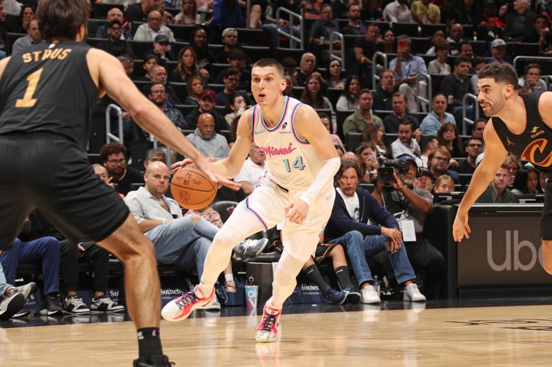 MIAMI, FL - JANUARY 29: Tyler Herro #14 of the Miami Heat handles the ball during the game against the Cleveland Cavaliers on January 29, 2025 at Kaseya Center in Miami, Florida. NOTE TO USER: User expressly acknowledges and agrees that, by downloading and or using this Photograph, user is consenting to the terms and conditions of the Getty Images License Agreement. Mandatory Copyright Notice: Copyright 2025 NBAE (Photo by Issac Baldizon/NBAE via Getty Images)