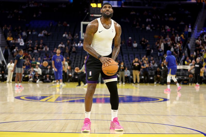 SAN FRANCISCO, CALIFORNIA - OCTOBER 18: LeBron James #23 of the Los Angeles Lakers warms up before their preseason game against the Golden State Warriors at Chase Center on October 18, 2024 in San Francisco, California.  NOTE TO USER: User expressly acknowledges and agrees that, by downloading and/or using this photograph, user is consenting to the terms and conditions of the Getty Images License Agreement.  (Photo by Ezra Shaw/Getty Images)