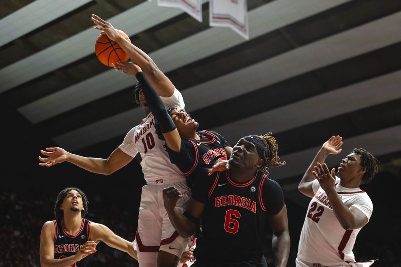 Feb 1, 2025; Tuscaloosa, Alabama, USA; Georgia Bulldogs forward RJ Godfrey (10) blocks a shot by Georgia Bulldogs guard Tyrin Lawrence (7) during the second half at Coleman Coliseum. Mandatory Credit: Will McLelland-Imagn Images