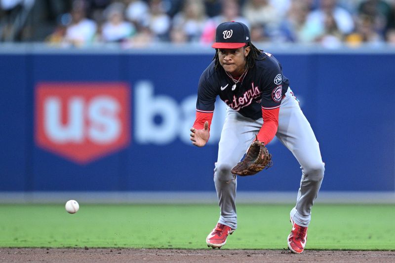 Jun 23, 2023; San Diego, California, USA; Washington Nationals shortstop C.J. Abrams (5) fields a ground ball hit by San Diego Padres San Diego Padres second baseman Ha-seong Kim (not pictured) during the third inning at Petco Park. Mandatory Credit: Orlando Ramirez-USA TODAY Sports