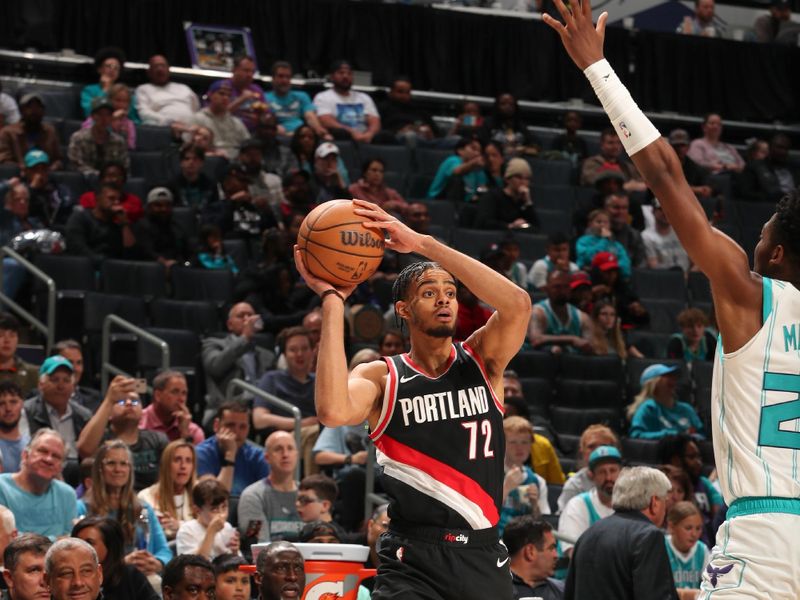 CHARLOTTE, NC - APRIL 3: Rayan Rupert #72 of the Portland Trail Blazers handles the ball during the game on April 3, 2024 at Spectrum Center in Charlotte, North Carolina. NOTE TO USER: User expressly acknowledges and agrees that, by downloading and or using this photograph, User is consenting to the terms and conditions of the Getty Images License Agreement. Mandatory Copyright Notice: Copyright 2024 NBAE (Photo by Kent Smith/NBAE via Getty Images)