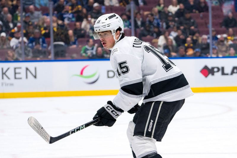 Jan 16, 2025; Vancouver, British Columbia, CAN; Los Angeles Kings forward Alex Turcotte (15) skates against the Vancouver Canucks in the third period at Rogers Arena. Mandatory Credit: Bob Frid-Imagn Images