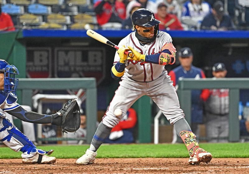 Apr 15, 2023; Kansas City, Missouri, USA;  Atlanta Braves right fielder Ronald Acuna Jr. (13) reacts after getting hit with a pitch during the eighth inning against the Kansas City Royals at Kauffman Stadium. Mandatory Credit: Peter Aiken-USA TODAY Sports