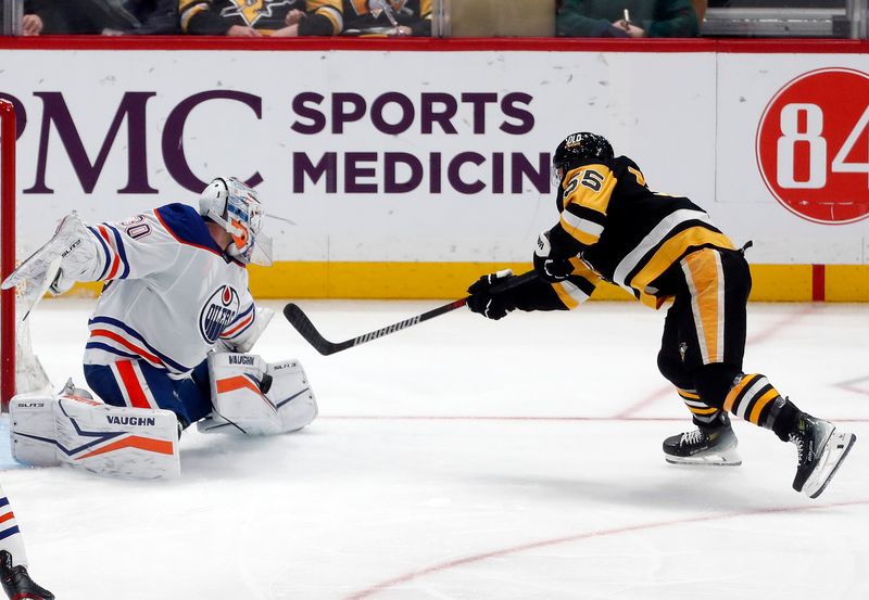 Mar 10, 2024; Pittsburgh, Pennsylvania, USA;  Edmonton Oilers goaltender Calvin Pickard (30) makes a save against Pittsburgh Penguins center Noel Acciari (55) during the third period at PPG Paints Arena. The Oilers won 4-0. Mandatory Credit: Charles LeClaire-USA TODAY Sports