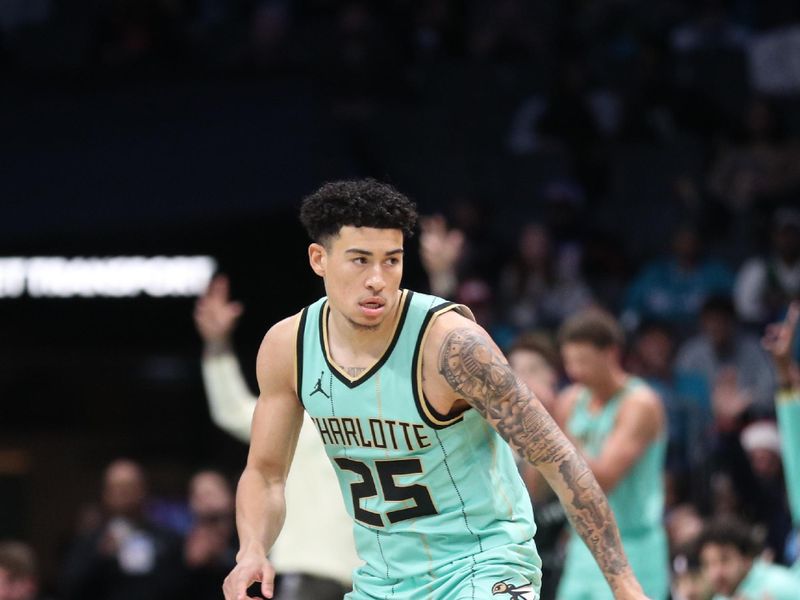 CHARLOTTE, NC - NOVEMBER 30: KJ Simpson #25 of the Charlotte Hornets looks on during the game against the Atlanta Hawks on November 30, 2024 at Spectrum Center in Charlotte, North Carolina. NOTE TO USER: User expressly acknowledges and agrees that, by downloading and or using this photograph, User is consenting to the terms and conditions of the Getty Images License Agreement. Mandatory Copyright Notice: Copyright 2024 NBAE (Photo by Brock Williams-Smith/NBAE via Getty Images)