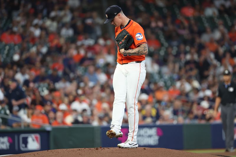 Oct 2, 2024; Houston, Texas, USA; Houston Astros pitcher Hunter Brown (58) prepares to throw against the Detroit Tigers during the first inning of game two of the Wildcard round for the 2024 MLB Playoffs at Minute Maid Park. Mandatory Credit: Thomas Shea-Imagn Images