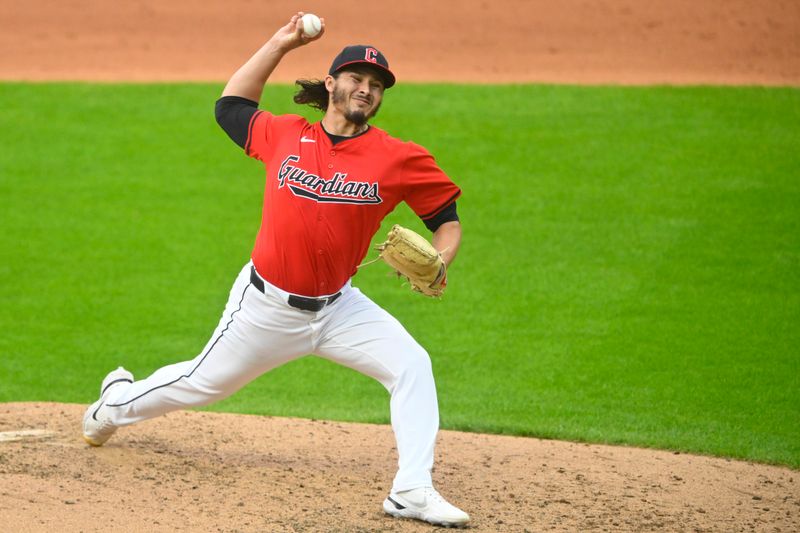 Jul 3, 2024; Cleveland, Ohio, USA; Cleveland Guardians relief pitcher Eli Morgan (49) delivers a pitch in the fifth inning against the Chicago White Sox at Progressive Field. Mandatory Credit: David Richard-USA TODAY Sports