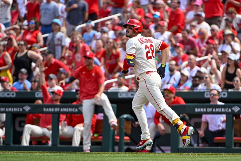 May 6, 2023; St. Louis, Missouri, USA;  St. Louis Cardinals third baseman Nolan Arenado (28) hits a two run home run against the Detroit Tigers during the fifth inning at Busch Stadium. Mandatory Credit: Jeff Curry-USA TODAY Sports