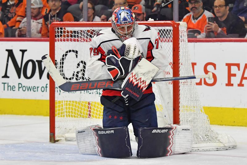 Apr 16, 2024; Philadelphia, Pennsylvania, USA; Washington Capitals goaltender Charlie Lindgren (79) makes a save against the Philadelphia Flyers during the second period at Wells Fargo Center. Mandatory Credit: Eric Hartline-USA TODAY Sports