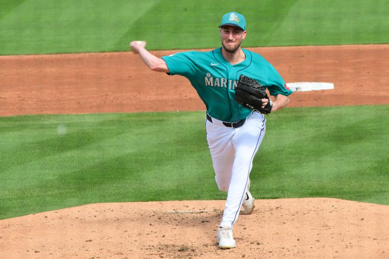 Feb 20, 2026; Peoria, Arizona, USA; Seattle Mariners pitcher Cooper Criswell (18) throws in the third inning against the San Diego Padres during a Spring Training game at Peoria Sports Complex. Mandatory Credit: Matt Kartozian-Imagn Images