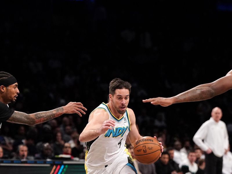 BROOKLYN, NY - January 6: T.J. McConnell #9 of the Indiana Pacers handles the ball during the game against the Brooklyn Nets on January 6, 2025 at Barclays Center in Brooklyn, New York. NOTE TO USER: User expressly acknowledges and agrees that, by downloading and or using this Photograph, user is consenting to the terms and conditions of the Getty Images License Agreement. Mandatory Copyright Notice: Copyright 2025 NBAE (Photo by Catalina Fragoso/NBAE via Getty Images)