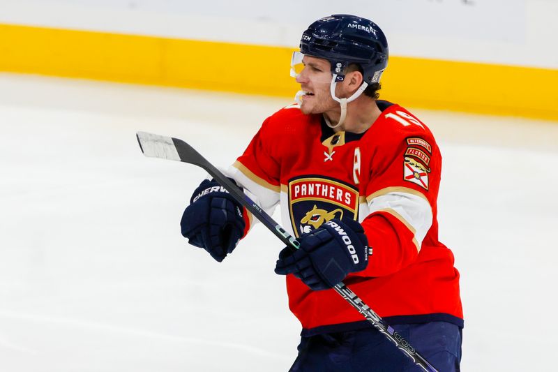 Apr 4, 2023; Sunrise, Florida, USA; Florida Panthers left wing Matthew Tkachuk (19) reacts after scoring during the third period against the Buffalo Sabres at FLA Live Arena. Mandatory Credit: Sam Navarro-USA TODAY Sports