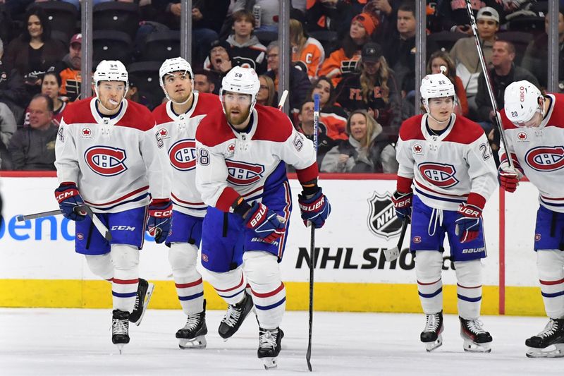 Jan 10, 2024; Philadelphia, Pennsylvania, USA; Montreal Canadiens defenseman David Savard (58) celebrates his goal with teammates against the Philadelphia Flyers during the first period at Wells Fargo Center. Mandatory Credit: Eric Hartline-USA TODAY Sports