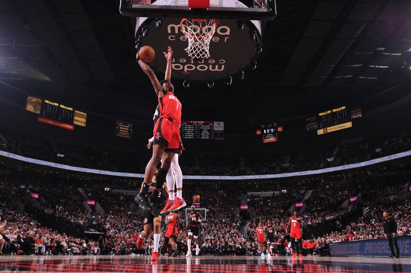 PORTLAND, OR - APRIL 12: Amen Thompson #1 of the Houston Rockets drives to the basket during the game against the Portland Trail Blazers on April 12, 2024 at the Moda Center Arena in Portland, Oregon. NOTE TO USER: User expressly acknowledges and agrees that, by downloading and or using this photograph, user is consenting to the terms and conditions of the Getty Images License Agreement. Mandatory Copyright Notice: Copyright 2024 NBAE (Photo by Cameron Browne/NBAE via Getty Images)