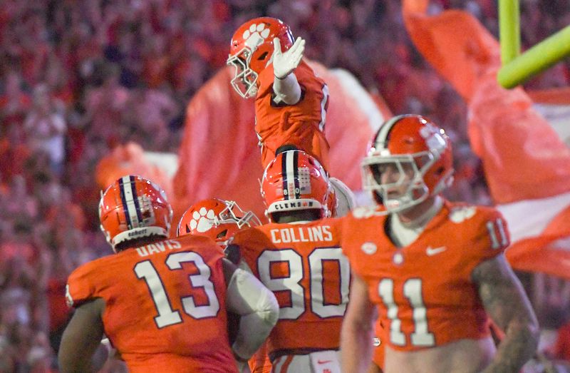 Sep 16, 2023; Clemson, South Carolina; Clemson receiver Tyler Brown (6) is congratulated by teammates after he scored a touchdown during the first quarter against Florida Atlantic at Memorial Stadium.  Mandatory Credit: Ken Ruinard-USA TODAY NETWORK