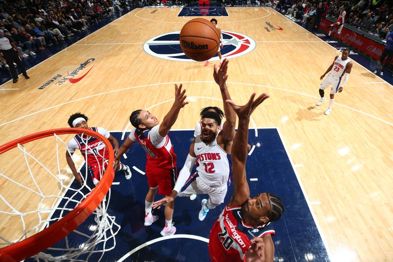 WASHINGTON, DC -? NOVEMBER 17: Tobias Harris #12 of the Detroit Pistons drives to the basket during the game against the Washington Wizards on November 17, 2024 at Capital One Arena in Washington, DC. NOTE TO USER: User expressly acknowledges and agrees that, by downloading and or using this Photograph, user is consenting to the terms and conditions of the Getty Images License Agreement. Mandatory Copyright Notice: Copyright 2024 NBAE (Photo by Stephen Gosling/NBAE via Getty Images)