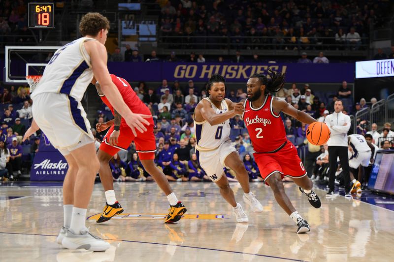 Jan 11, 2026; Seattle, Washington, USA; Ohio State Buckeyes guard Bruce Thornton (2) dribbles the ball while guarded by Washington Huskies guard Quimari Peterson (0) during the second half at Alaska Airlines Arena at Hec Edmundson Pavilion. Mandatory Credit: Steven Bisig-Imagn Images