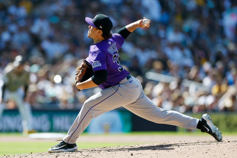 Apr 13, 2025; San Diego, California, USA; Colorado Rockies relief pitcher Victor Vodnik (38) throws a pitch during the eighth inning against the San Diego Padres at Petco Park. Mandatory Credit: David Frerker-Imagn Images