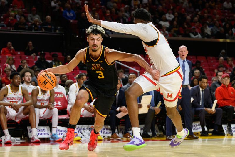 Jan 13, 2025; College Park, Maryland, USA; Minnesota Golden Gophers forward Dawson Garcia (3) drives to the basket as Maryland Terrapins center Derik Queen (25) defends during the first half at Xfinity Center. Mandatory Credit: Reggie Hildred-Imagn Images