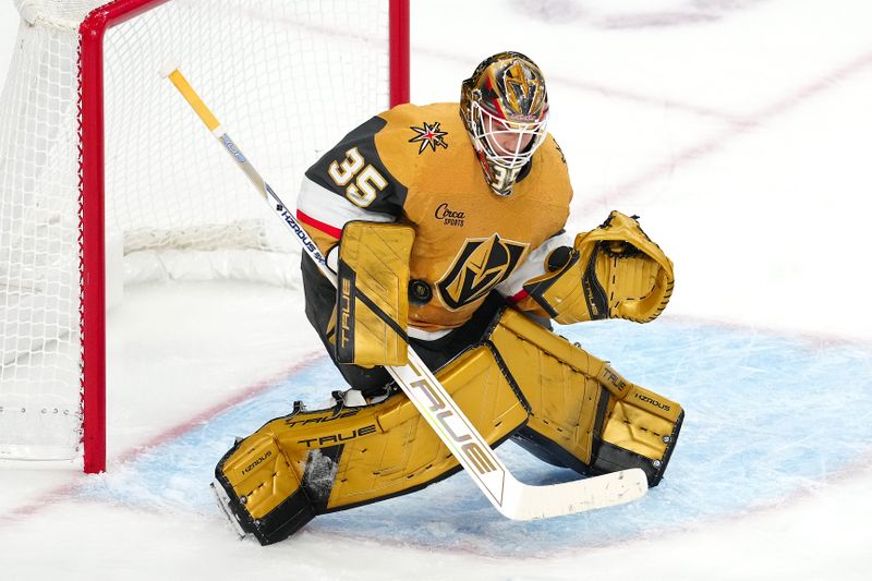 Oct 26, 2024; Las Vegas, Nevada, USA; Vegas Golden Knights goaltender Ilya Samsonov (35) makes a save against the San Jose Sharks during the third period at T-Mobile Arena. Mandatory Credit: Stephen R. Sylvanie-Imagn Images