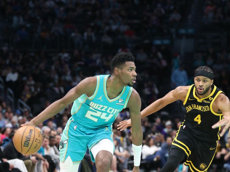 CHARLOTTE, NC - MARCH 29:  Brandon Miller #24 of the Charlotte Hornets handles the ball during the game against the Golden State Warriors on March 29, 2024 at Spectrum Center in Charlotte, North Carolina. NOTE TO USER: User expressly acknowledges and agrees that, by downloading and or using this photograph, User is consenting to the terms and conditions of the Getty Images License Agreement.  Mandatory Copyright Notice:  Copyright 2024 NBAE (Photo by Brock Williams-Smith/NBAE via Getty Images)