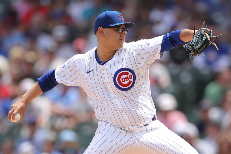 May 31, 2024; Chicago, Illinois, USA; Chicago Cubs pitcher Javier Assad (72) delivers a pitch during the first inning against the Cincinnati Reds at Wrigley Field. Mandatory Credit: Melissa Tamez-USA TODAY Sports