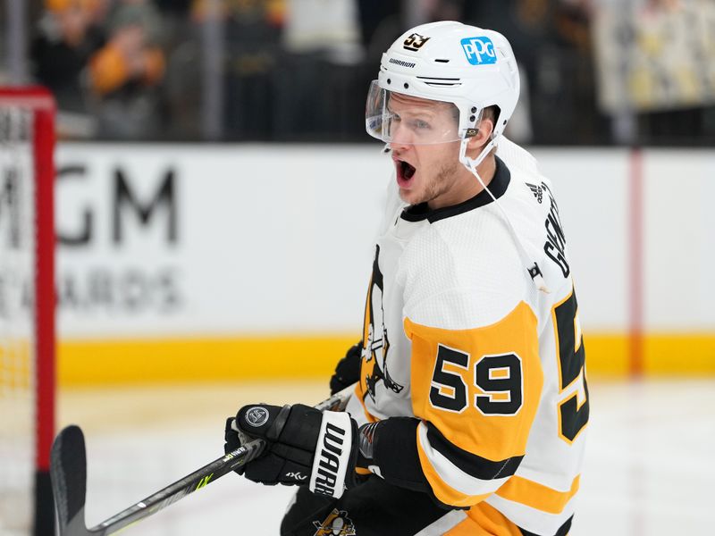 Jan 5, 2023; Las Vegas, Nevada, USA; Pittsburgh Penguins left wing Jake Guentzel (59) warms up before a game against the Vegas Golden Knights at T-Mobile Arena. Mandatory Credit: Stephen R. Sylvanie-USA TODAY Sports