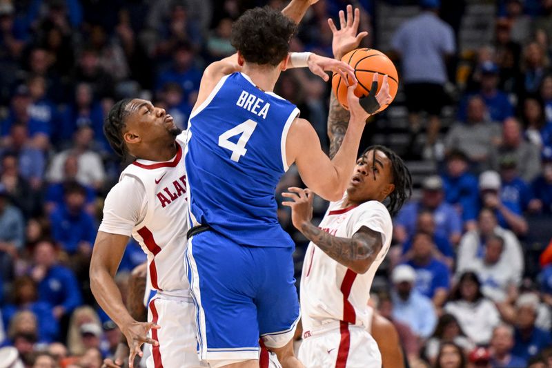 Alabama Crimson Tide forward Grant Nelson (4) and guard Mark Sears (1) strip the ball from Kentucky Wildcats guard Koby Brea (4) Mar 14, 2025; Nashville, TN, USA;  during the first half at Bridgestone Arena. Mandatory Credit: Steve Roberts-Imagn Images