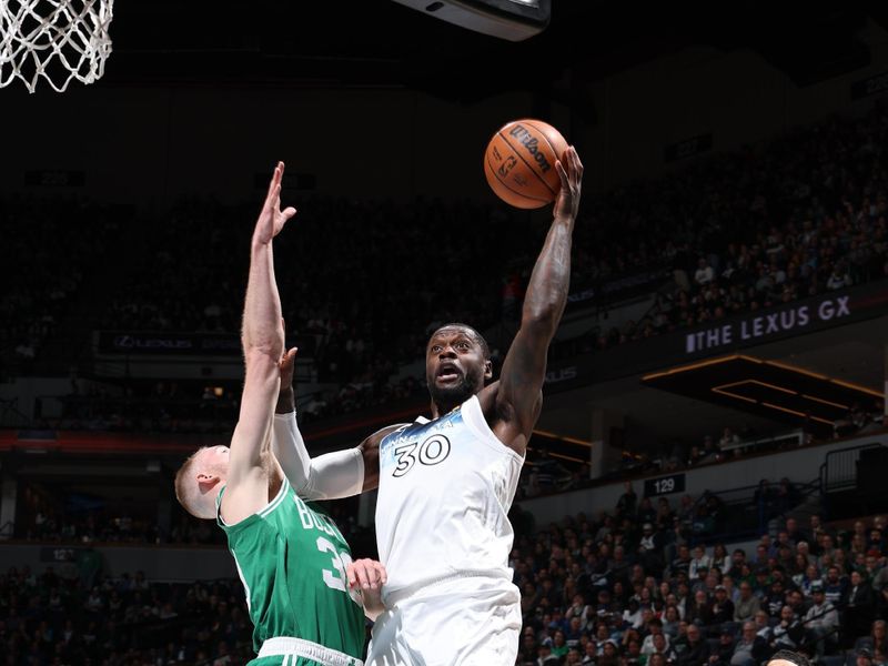 MINNEAPOLIS, MN - JANUARY 2: Julius Randle #30 of the Minnesota Timberwolves drives to the basket during the game against the Boston Celtics on January 2, 2025 at Target Center in Minneapolis, Minnesota. NOTE TO USER: User expressly acknowledges and agrees that, by downloading and or using this Photograph, user is consenting to the terms and conditions of the Getty Images License Agreement. Mandatory Copyright Notice: Copyright 2025 NBAE (Photo by David Sherman/NBAE via Getty Images)