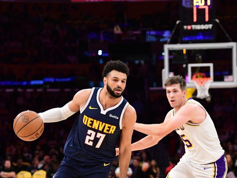 LOS ANGELES, CA - APRIL 27: Jamal Murray #27 of the Denver Nuggets drives to the basket during the game against the Los Angeles Lakers during Round 1 Game 4 of the 2024 NBA Playoffs on April 27, 2024 at Crypto.Com Arena in Los Angeles, California. NOTE TO USER: User expressly acknowledges and agrees that, by downloading and/or using this Photograph, user is consenting to the terms and conditions of the Getty Images License Agreement. Mandatory Copyright Notice: Copyright 2024 NBAE (Photo by Adam Pantozzi/NBAE via Getty Images)